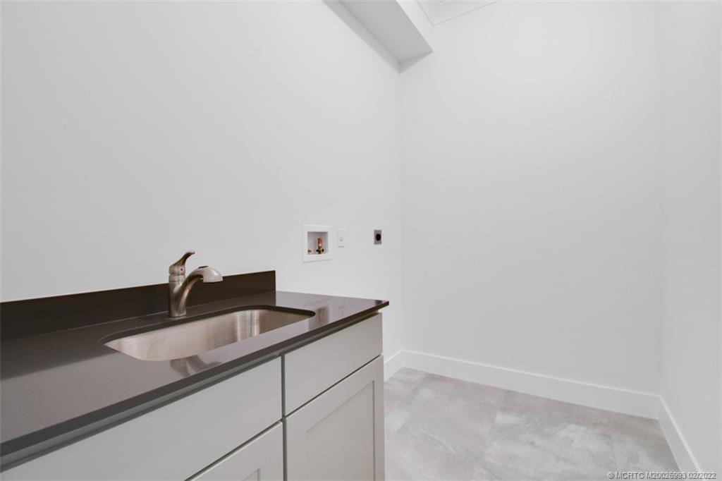 2171 Southwest Oasis Terrace Stuart, FL 34997 - Photo 47 of 86 Laundry Room