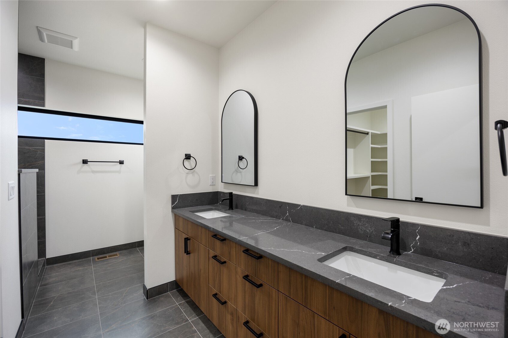 501 Sand Dune Road Moses Lake, WA 98837 - Photo 19 of 38 a bathroom with a granite countertop sink and a mirror