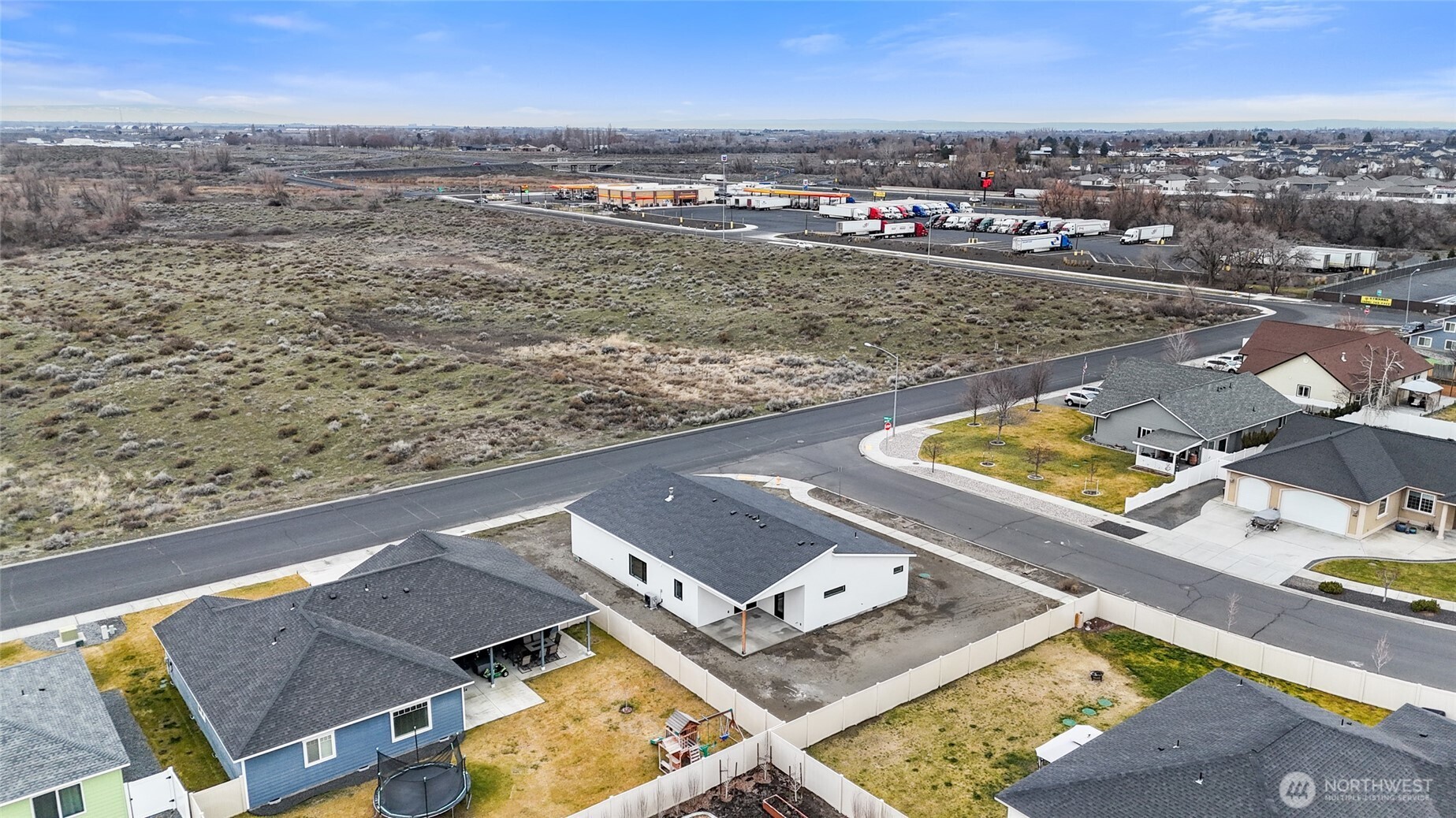 501 Sand Dune Road Moses Lake, WA 98837 - Photo 36 of 38 an aerial view of residential houses with outdoor space