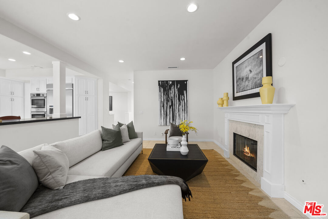 7861 West 80th Street Playa del Rey, CA 90293 - Photo 16 of 42 a living room with furniture and a fireplace