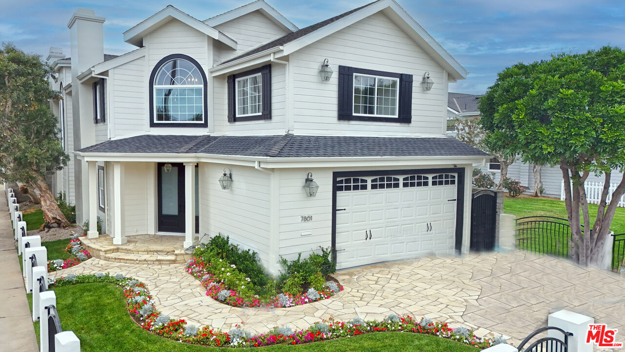 7861 West 80th Street Playa del Rey, CA 90293 - Photo 2 of 42 a front view of a house with a garden