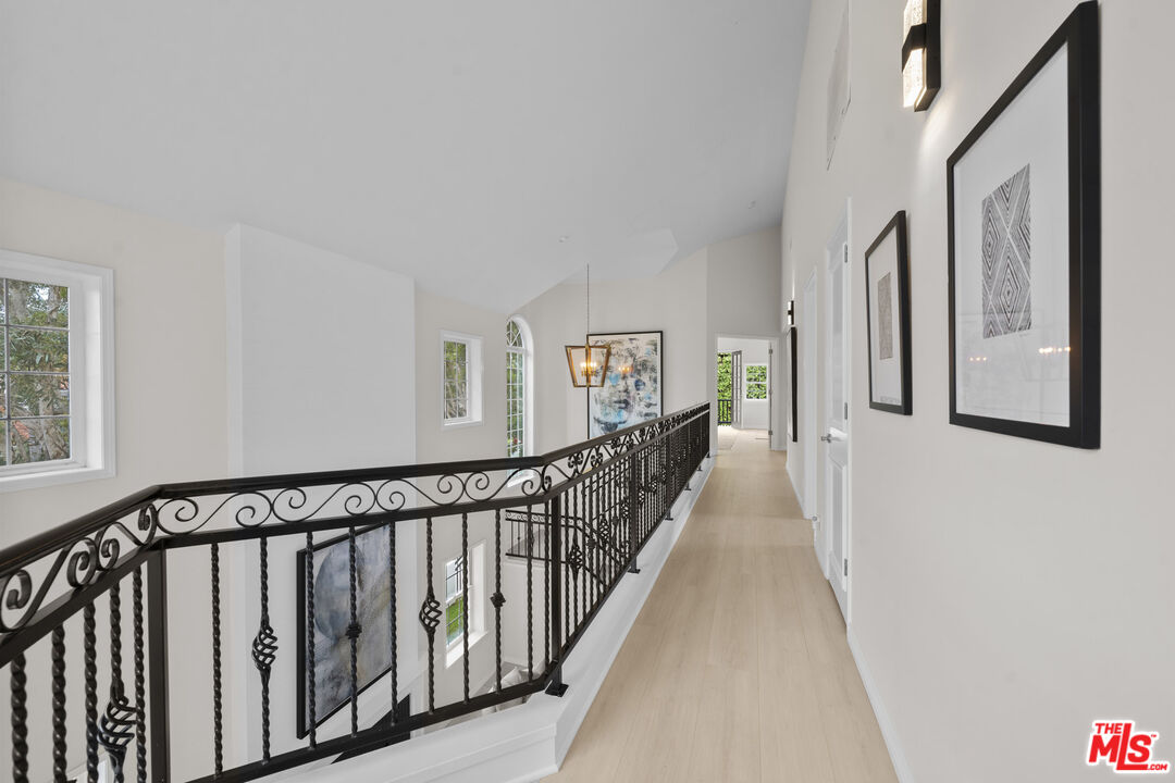 7861 West 80th Street Playa del Rey, CA 90293 - Photo 33 of 42 a view of a hallway with wooden floor and stairs