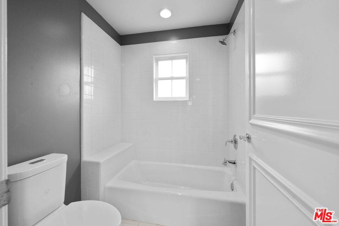 7861 West 80th Street Playa del Rey, CA 90293 - Photo 37 of 42 a bathroom with a toilet and a bathtub