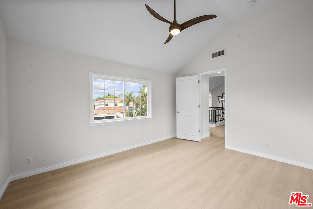 7861 West 80th Street Playa del Rey, CA 90293 - Photo 40 of 42 en empty room with window and ceiling fan