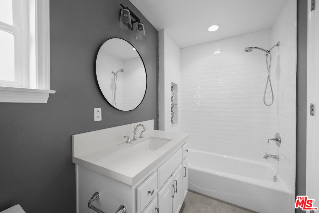 7861 West 80th Street Playa del Rey, CA 90293 - Photo 42 of 42 a bathroom with a sink a toilet and a mirror