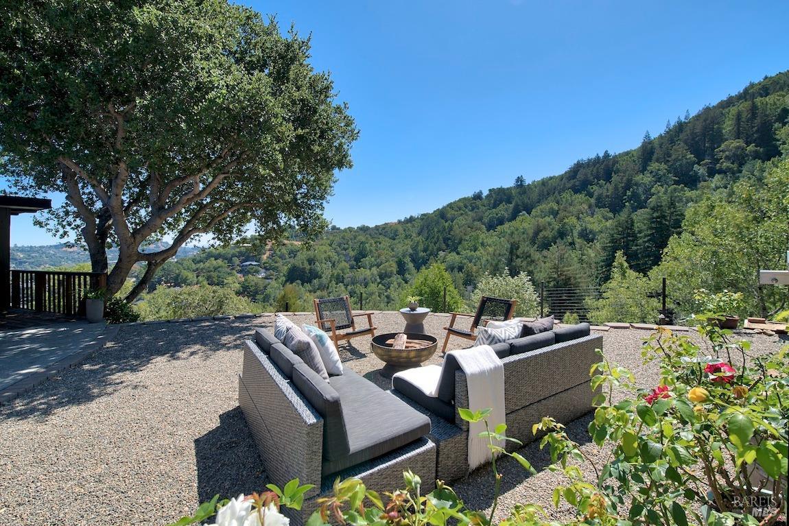 600 Murray Avenue Kentfield, CA 94904 - Photo 13 of 59 a view of a patio with couches table and chairs and potted plants
