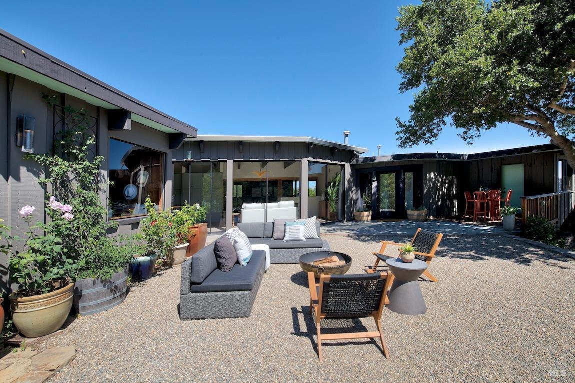 600 Murray Avenue Kentfield, CA 94904 - Photo 14 of 59 a view of a patio with couches and potted plants