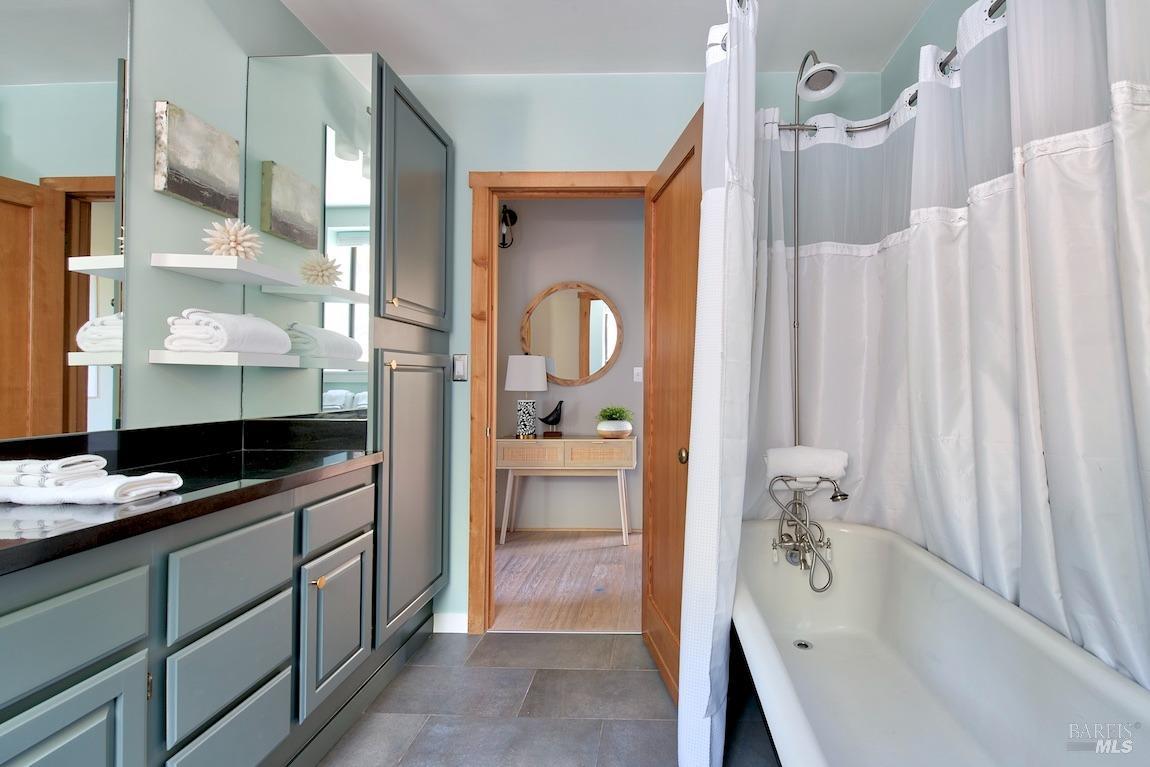 600 Murray Avenue Kentfield, CA 94904 - Photo 28 of 59 a bathroom with a tub sink and mirror