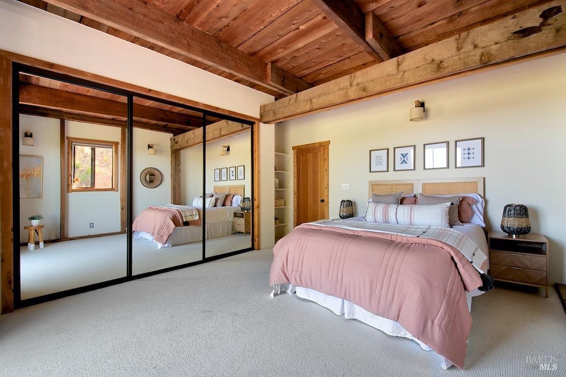 600 Murray Avenue Kentfield, CA 94904 - Photo 30 of 59 a spacious bedroom with a bed and a walk in closet