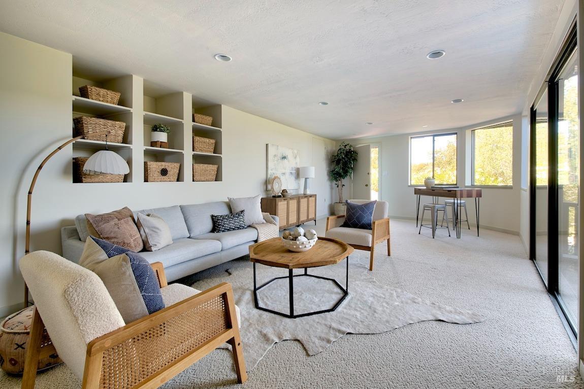 600 Murray Avenue Kentfield, CA 94904 - Photo 38 of 59 a living room with furniture and a floor to ceiling window
