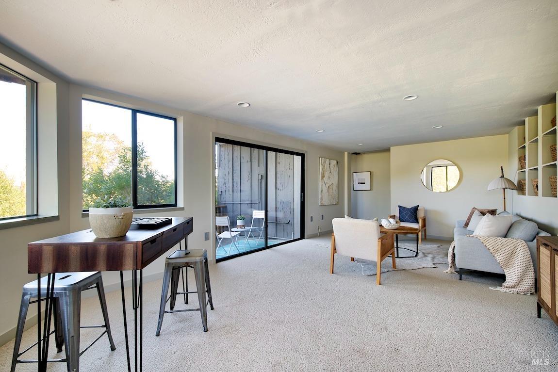600 Murray Avenue Kentfield, CA 94904 - Photo 39 of 59 a living room with furniture and a large window