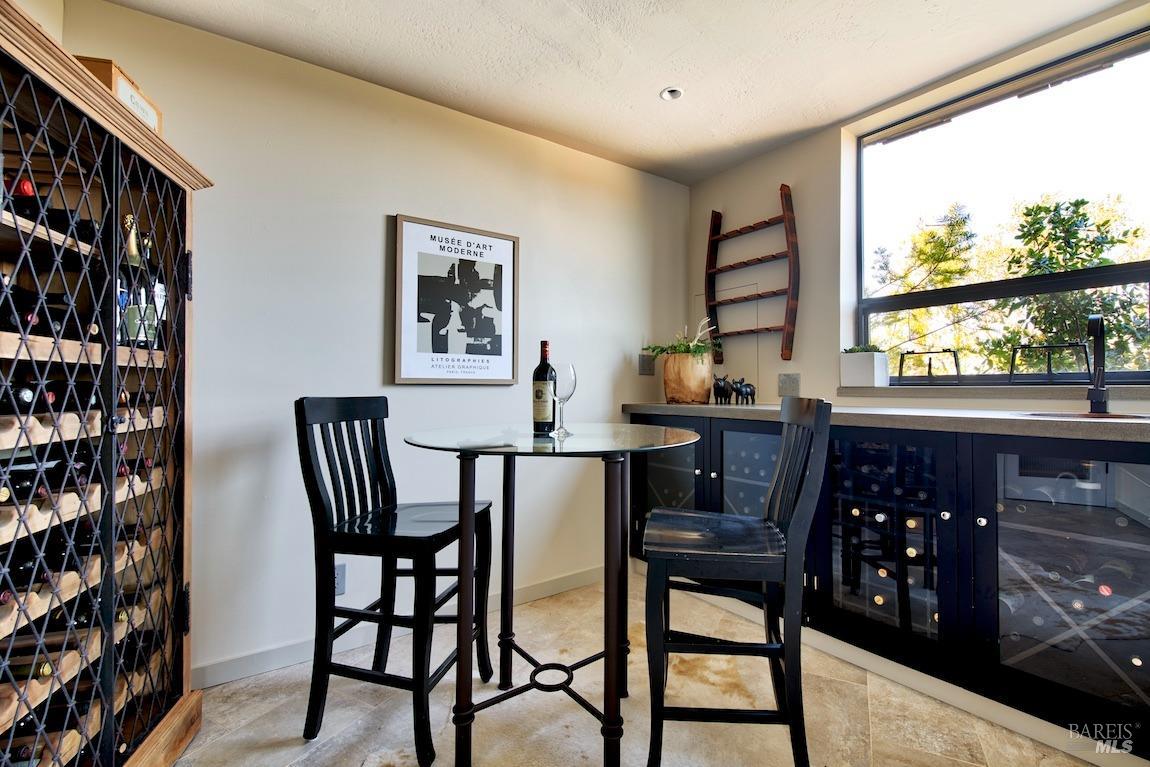 600 Murray Avenue Kentfield, CA 94904 - Photo 41 of 59 a view of a dining room with furniture and a window