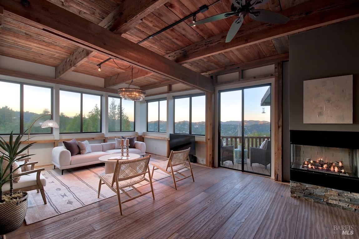600 Murray Avenue Kentfield, CA 94904 - Photo 54 of 59 a living room with furniture tv and wooden floor
