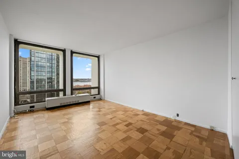 a view of an empty room with a window