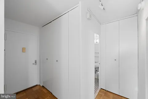 a view of hallway with closet