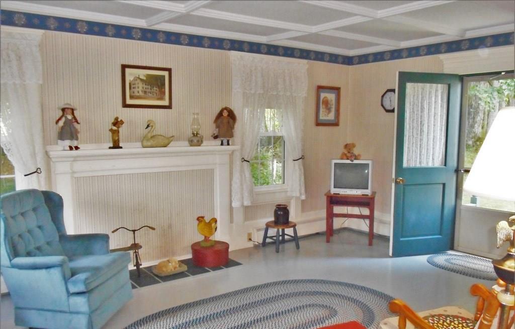 13 Old County Road Orland, ME 04472 - Photo 3 of 35 Living room has an exterior entry