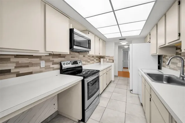 a bedroom with a bed and a table