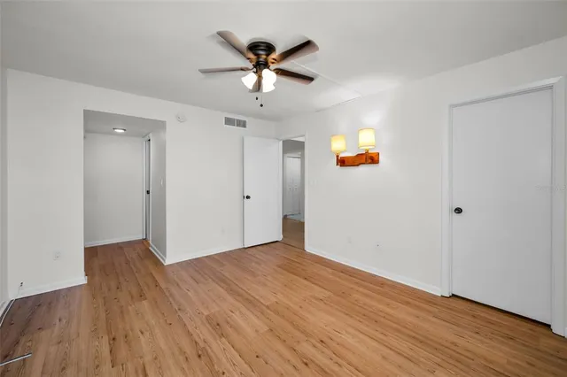 an aerial view of a house with a lake view