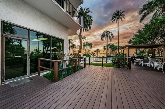 a view of a swimming pool with a garden