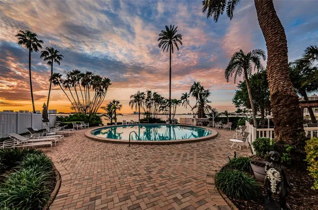 a view of entryway and hall with dining area