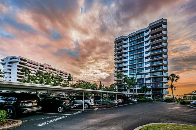 a view of a lake with a yard