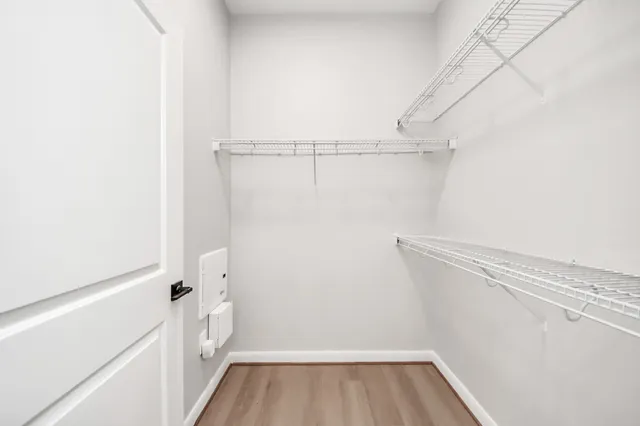 a bathroom with a tub and shower