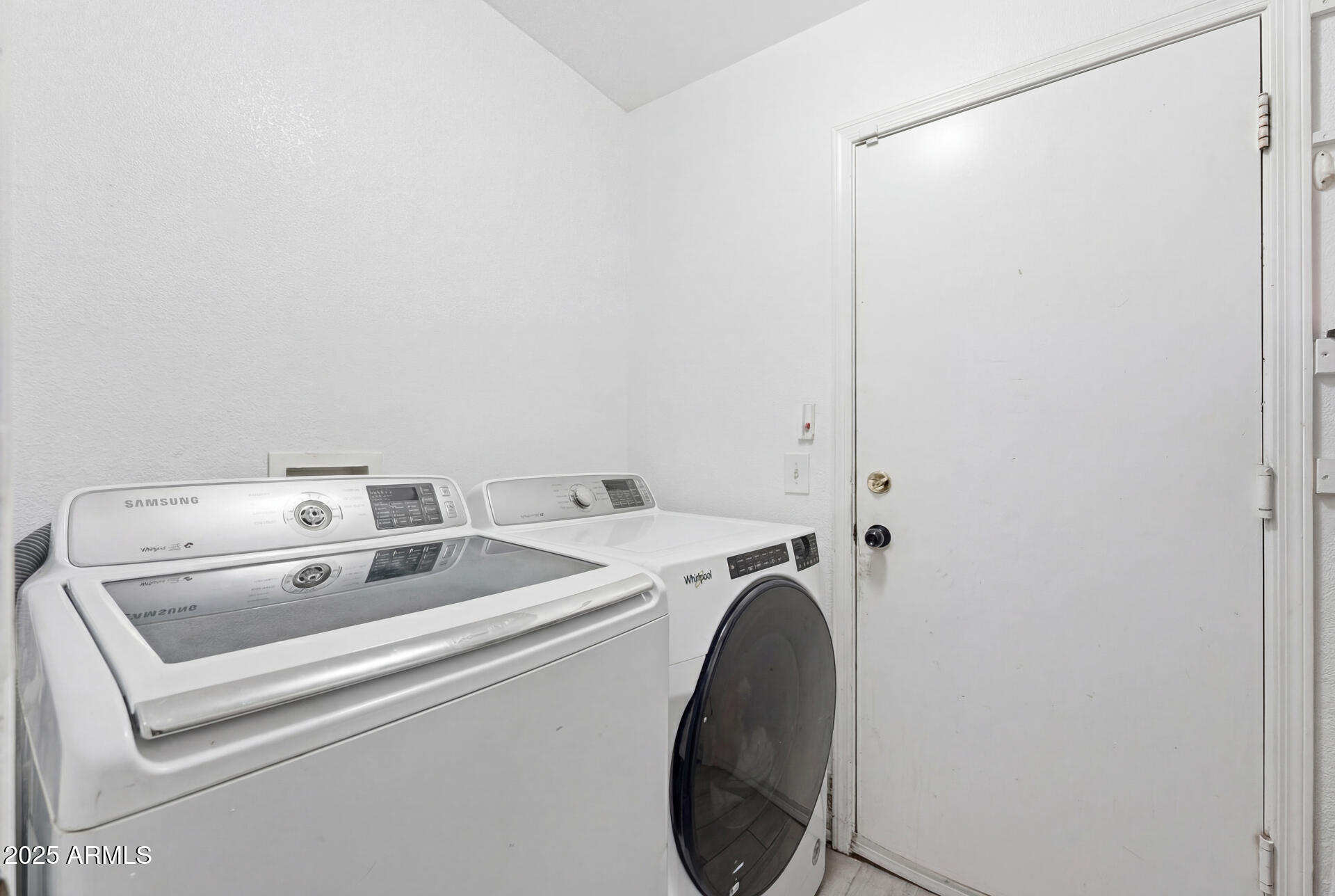 16065 West Jackson Street Goodyear, AZ 85338 - Photo 15 of 18 a utility room with dryer and washer