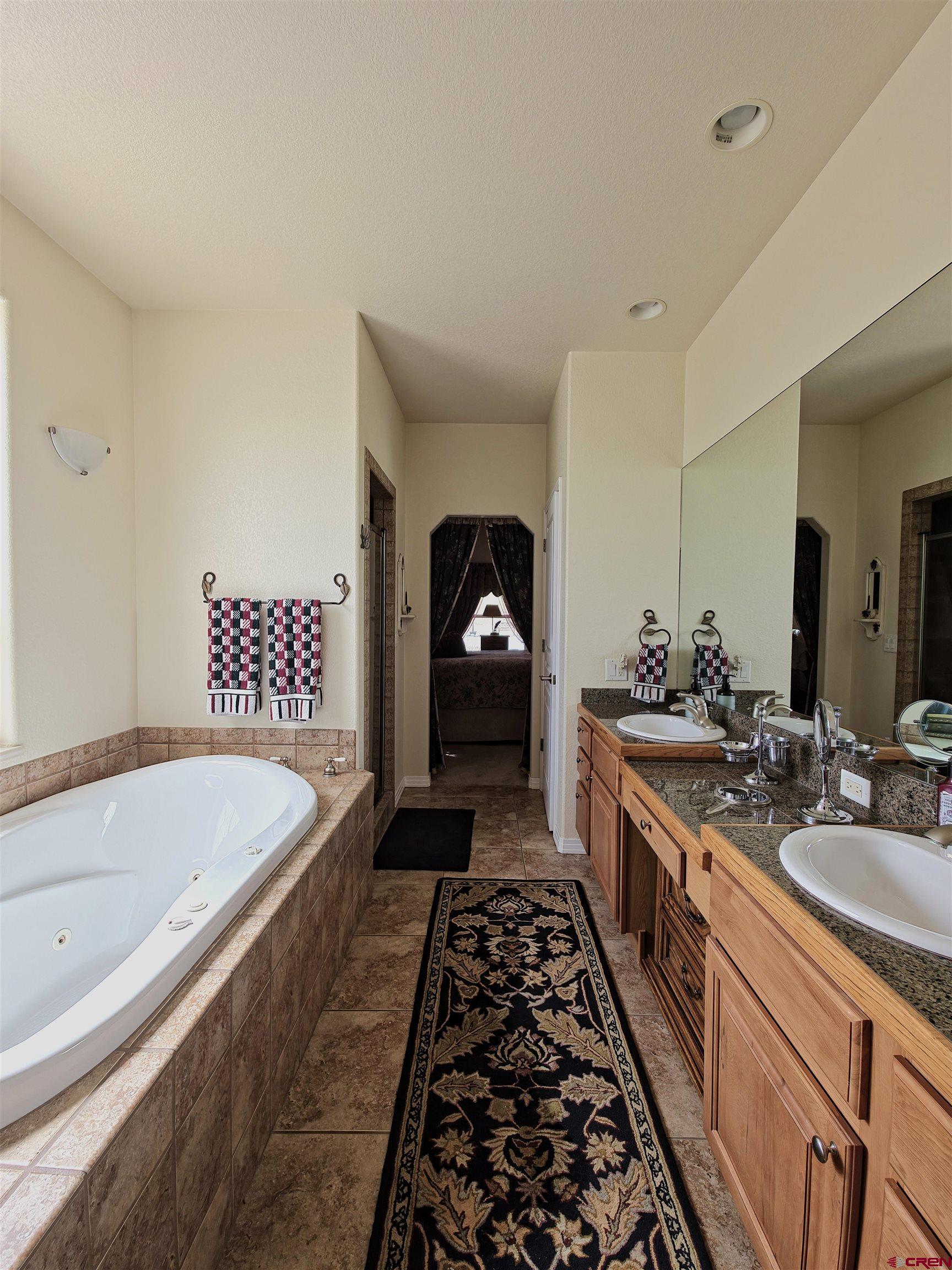 2357 5500th Road Delta, CO 81416 - Photo 16 of 37 a large white kitchen with a large window