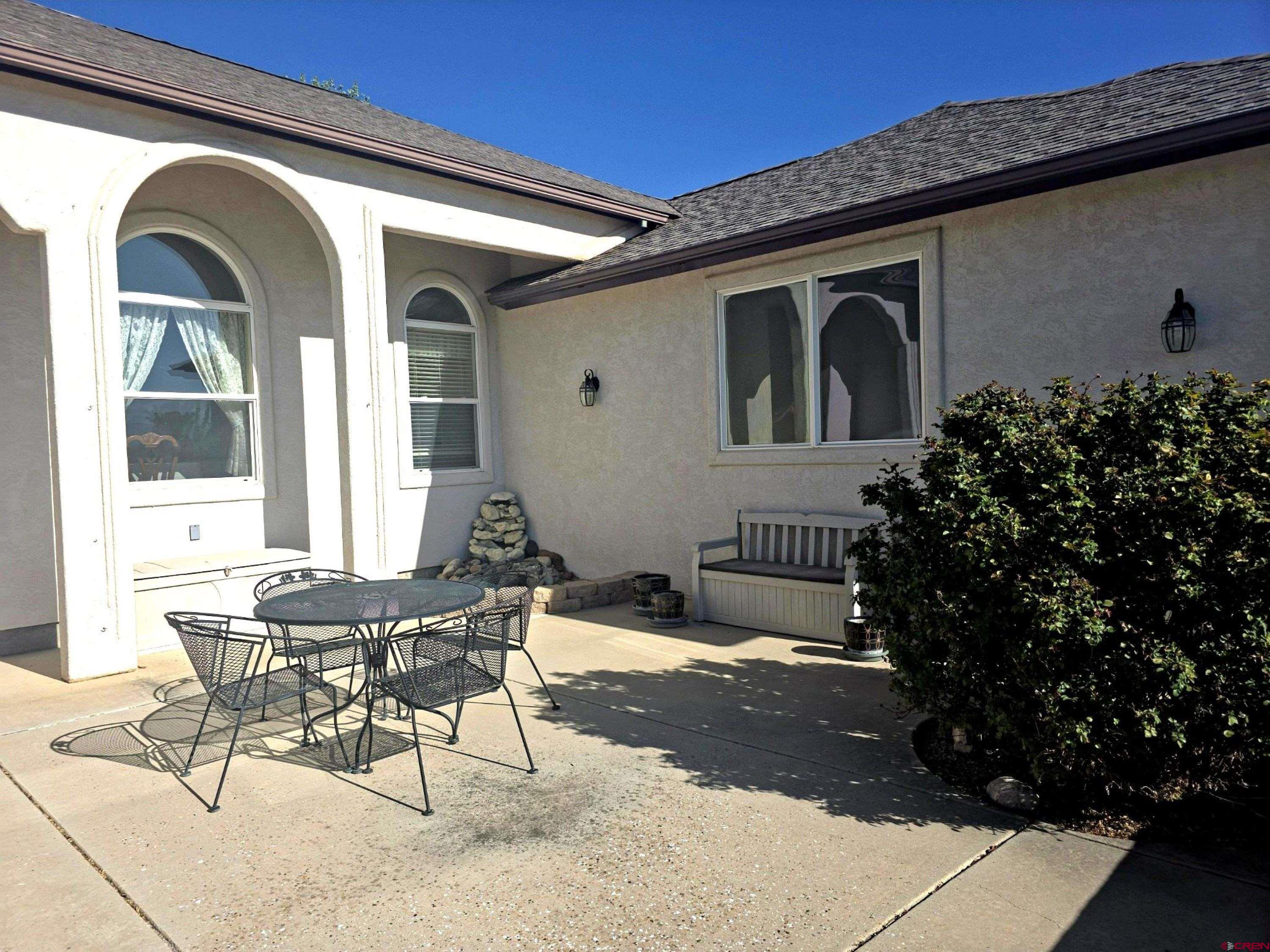 2357 5500th Road Delta, CO 81416 - Photo 30 of 37 a view of a patio with table and chairs and potted plants