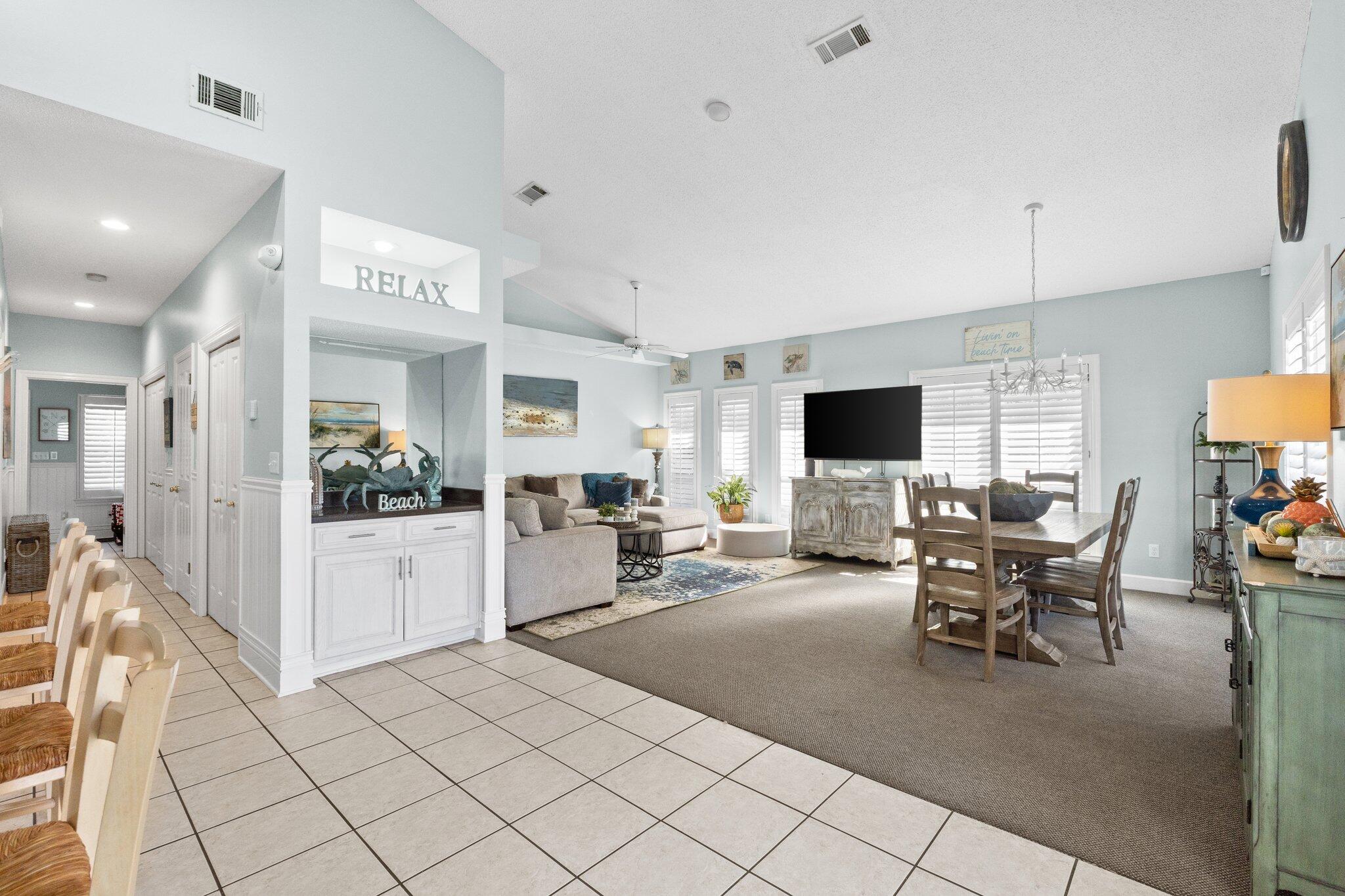 4460 Ocean View Drive Destin, FL 32541 - Photo 17 of 53 a living room with furniture and a flat screen tv