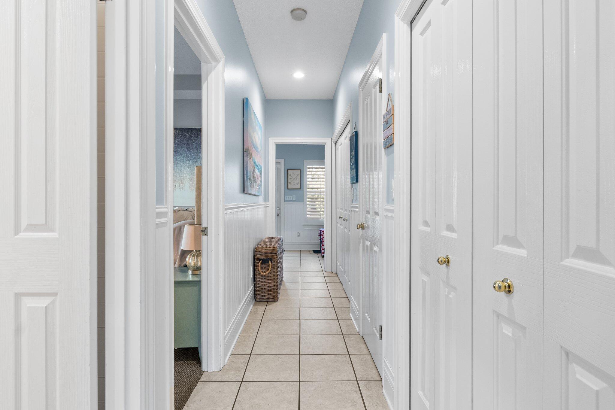 4460 Ocean View Drive Destin, FL 32541 - Photo 25 of 53 a view of a hallway with a white walls