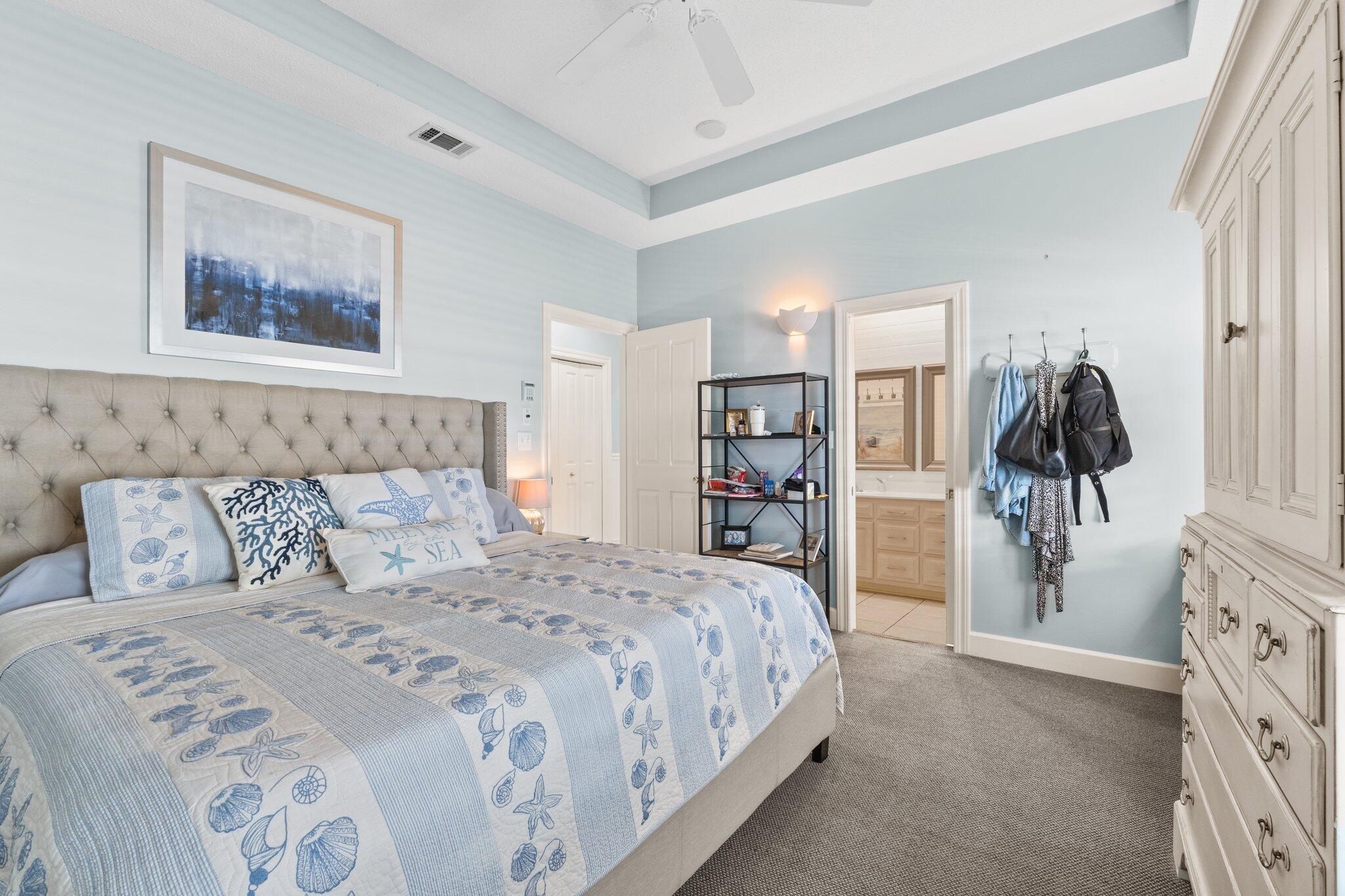 4460 Ocean View Drive Destin, FL 32541 - Photo 27 of 53 a bedroom with a bed and a walk in closet