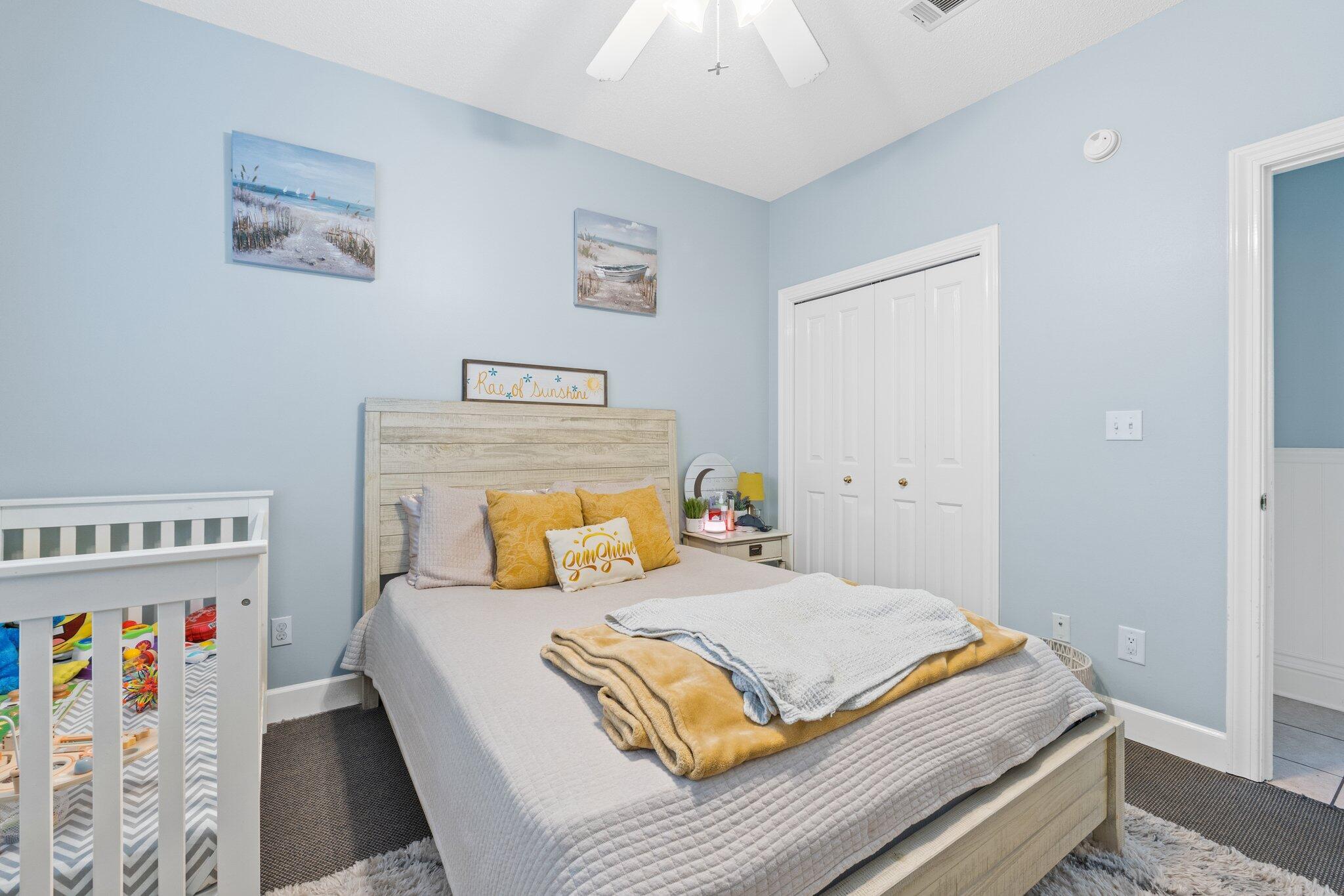 4460 Ocean View Drive Destin, FL 32541 - Photo 33 of 53 a bedroom with a bed and a window