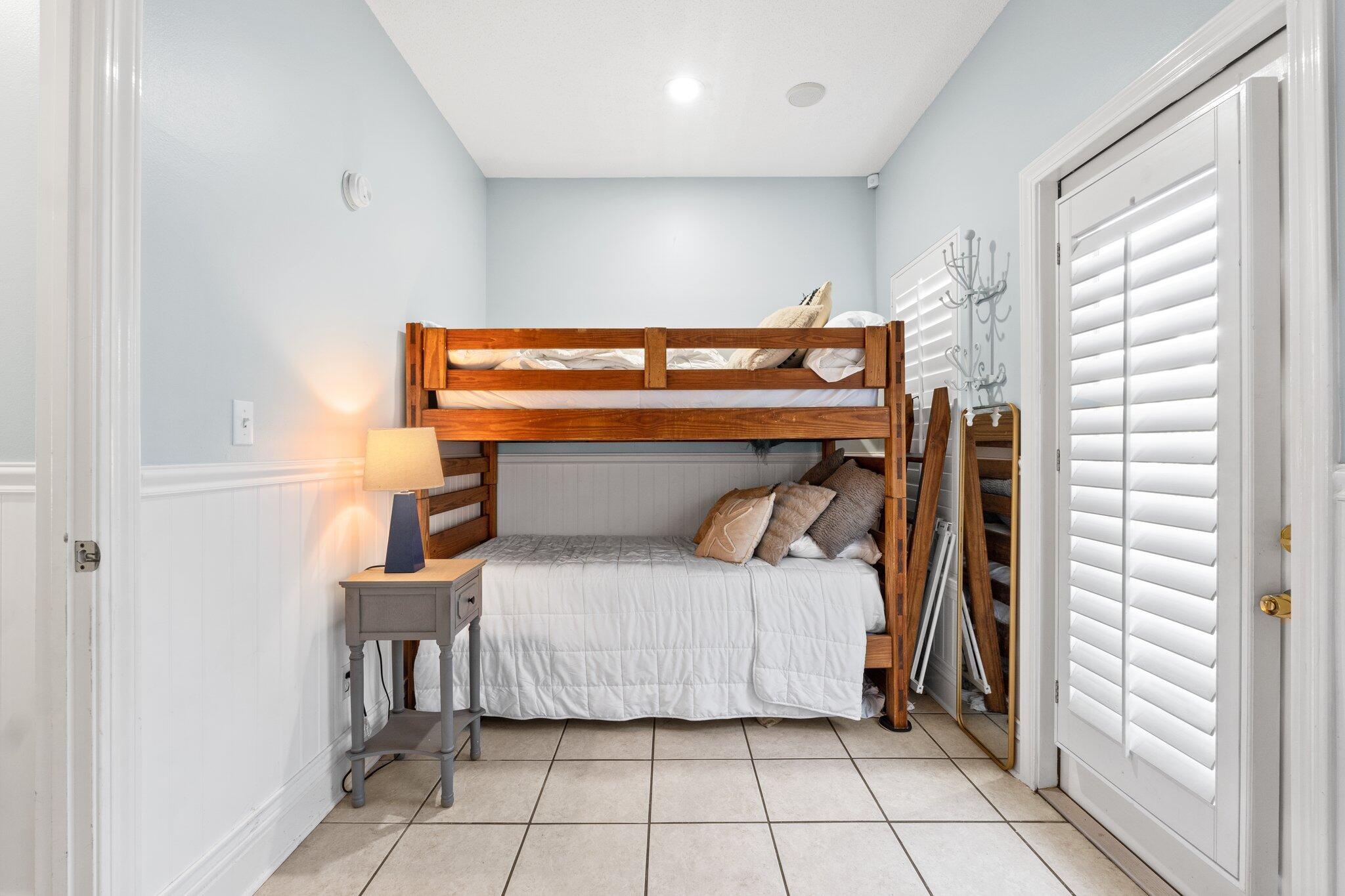 4460 Ocean View Drive Destin, FL 32541 - Photo 44 of 53 a bedroom with a bed and a window