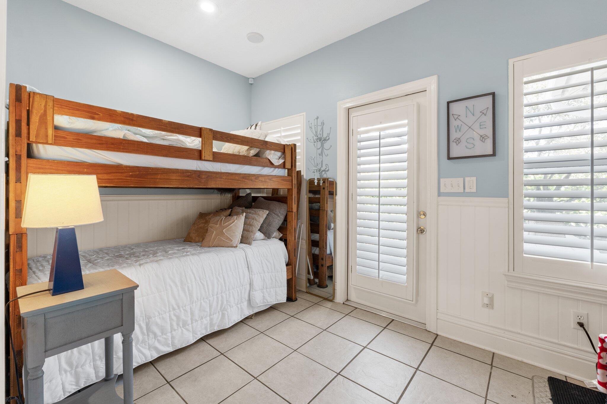 4460 Ocean View Drive Destin, FL 32541 - Photo 45 of 53 a bedroom with a bed and a window