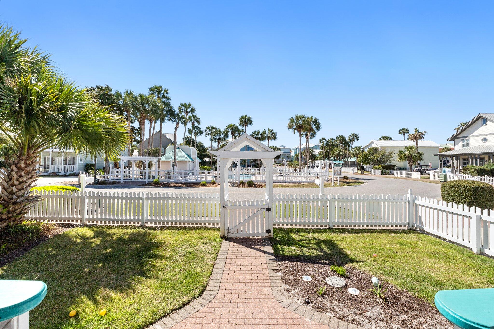 4460 Ocean View Drive Destin, FL 32541 - Photo 7 of 53 a swimming pool with outdoor seating and yard
