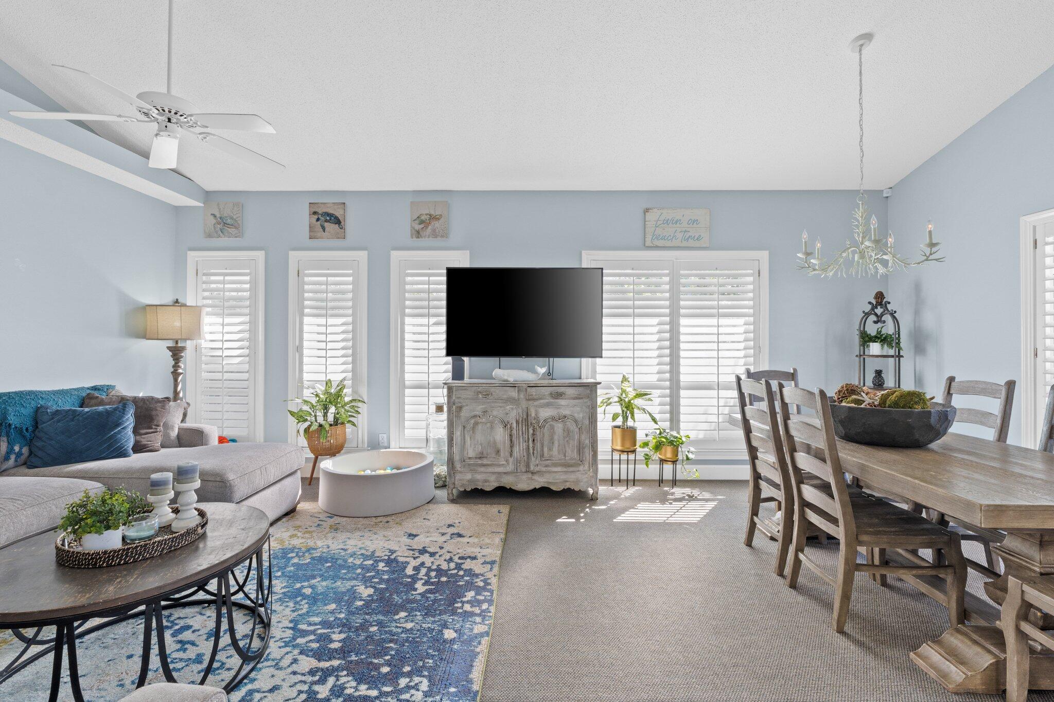 4460 Ocean View Drive Destin, FL 32541 - Photo 9 of 53 a living room with furniture and a flat screen tv