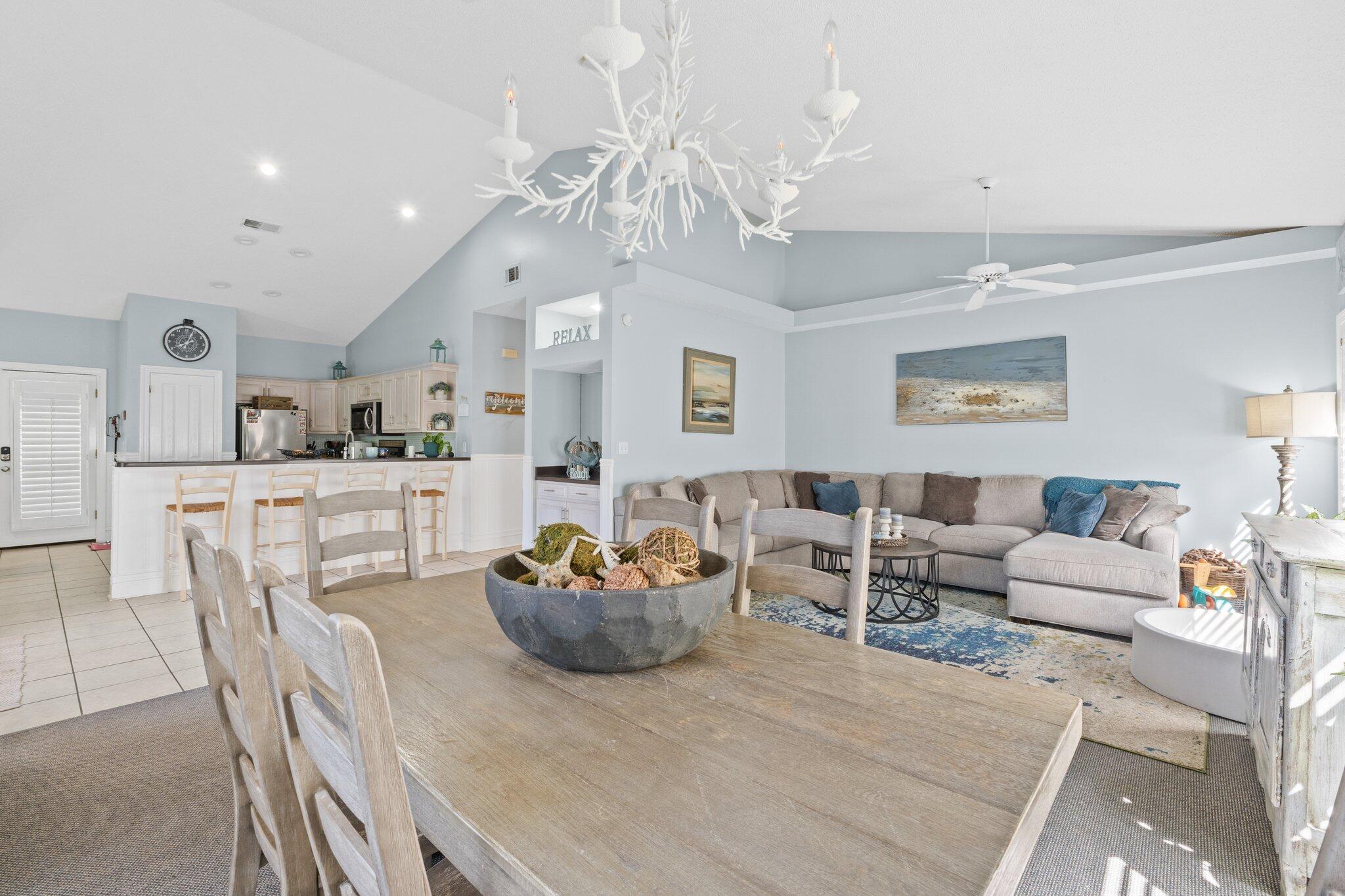 4460 Ocean View Drive Destin, FL 32541 - Photo 10 of 53 a living room with furniture and a chandelier