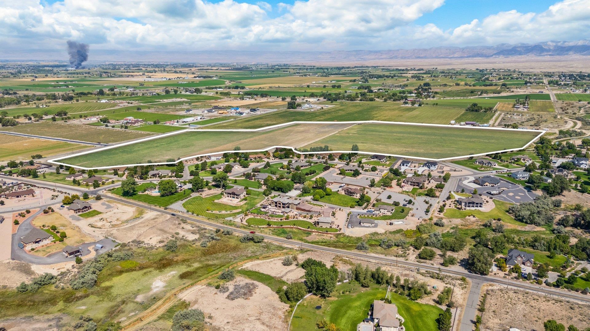 1050 22 1/2 Road Grand Junction, CO 81505 - Photo 9 of 20 a view of an outdoor space and a lake view