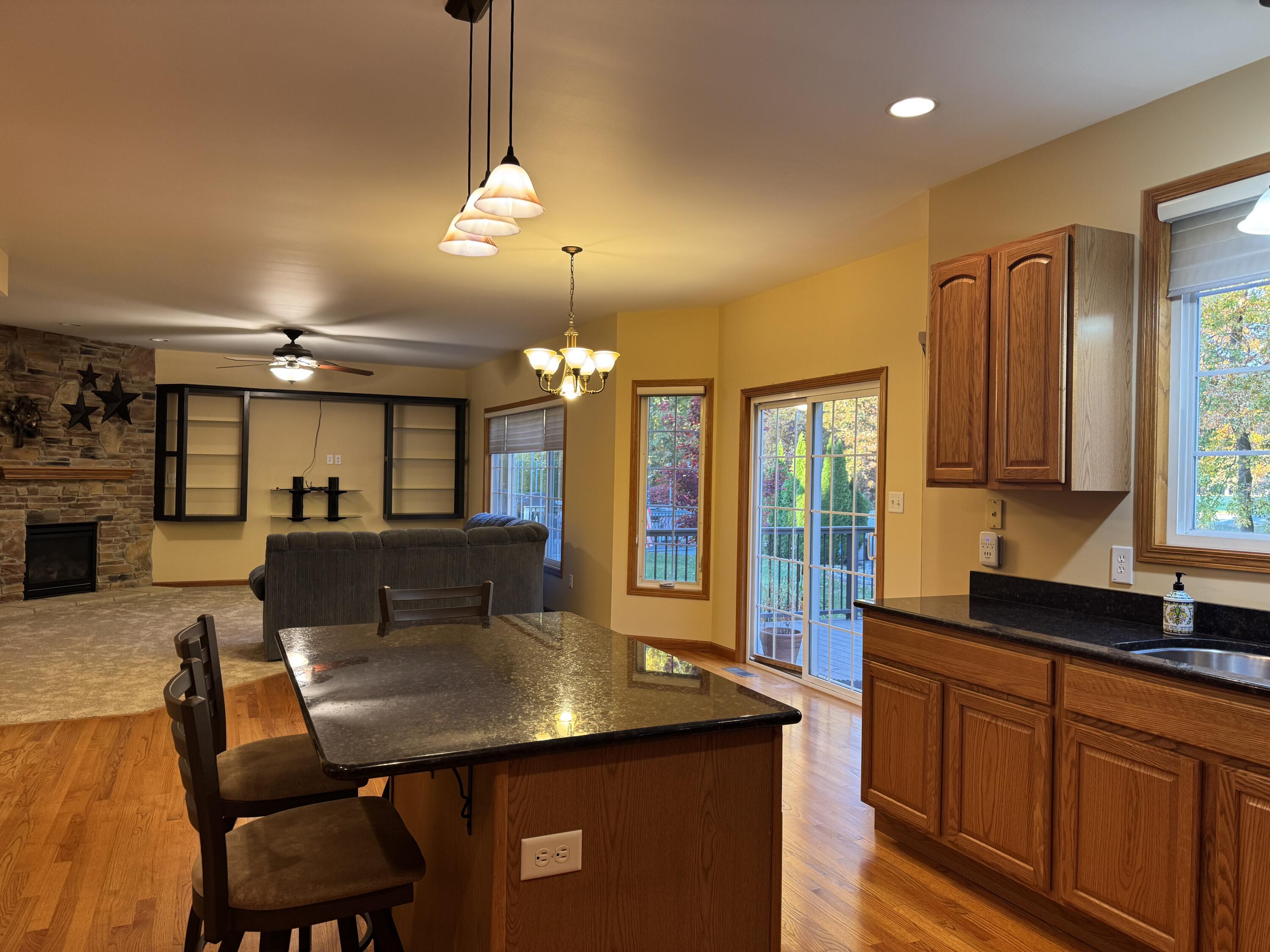1521 Birdie Way Chesterton, IN 46304 - Photo 18 of 58 a view of a dining room with furniture window and wooden floor