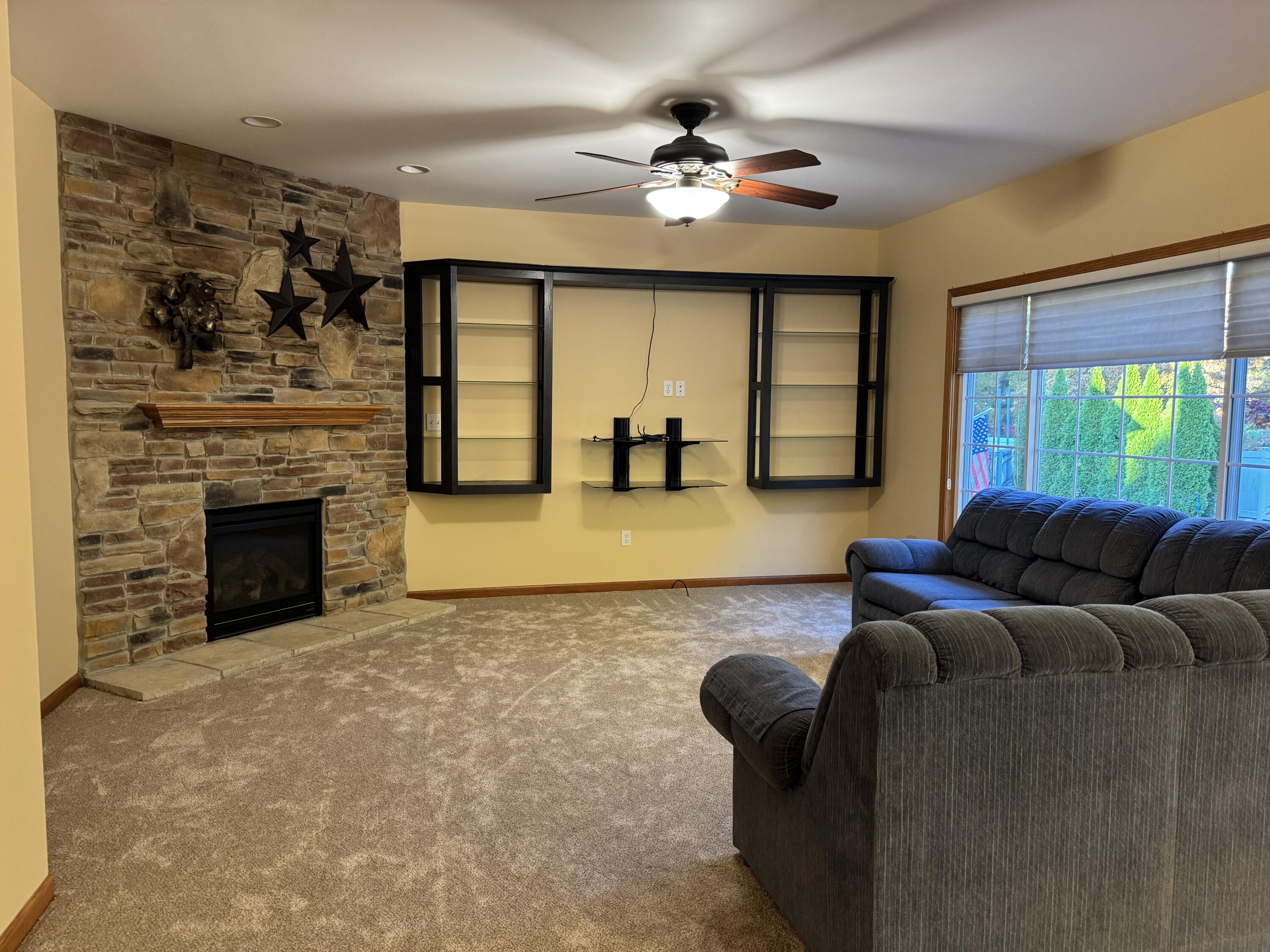 1521 Birdie Way Chesterton, IN 46304 - Photo 21 of 58 a living room with furniture and a fireplace