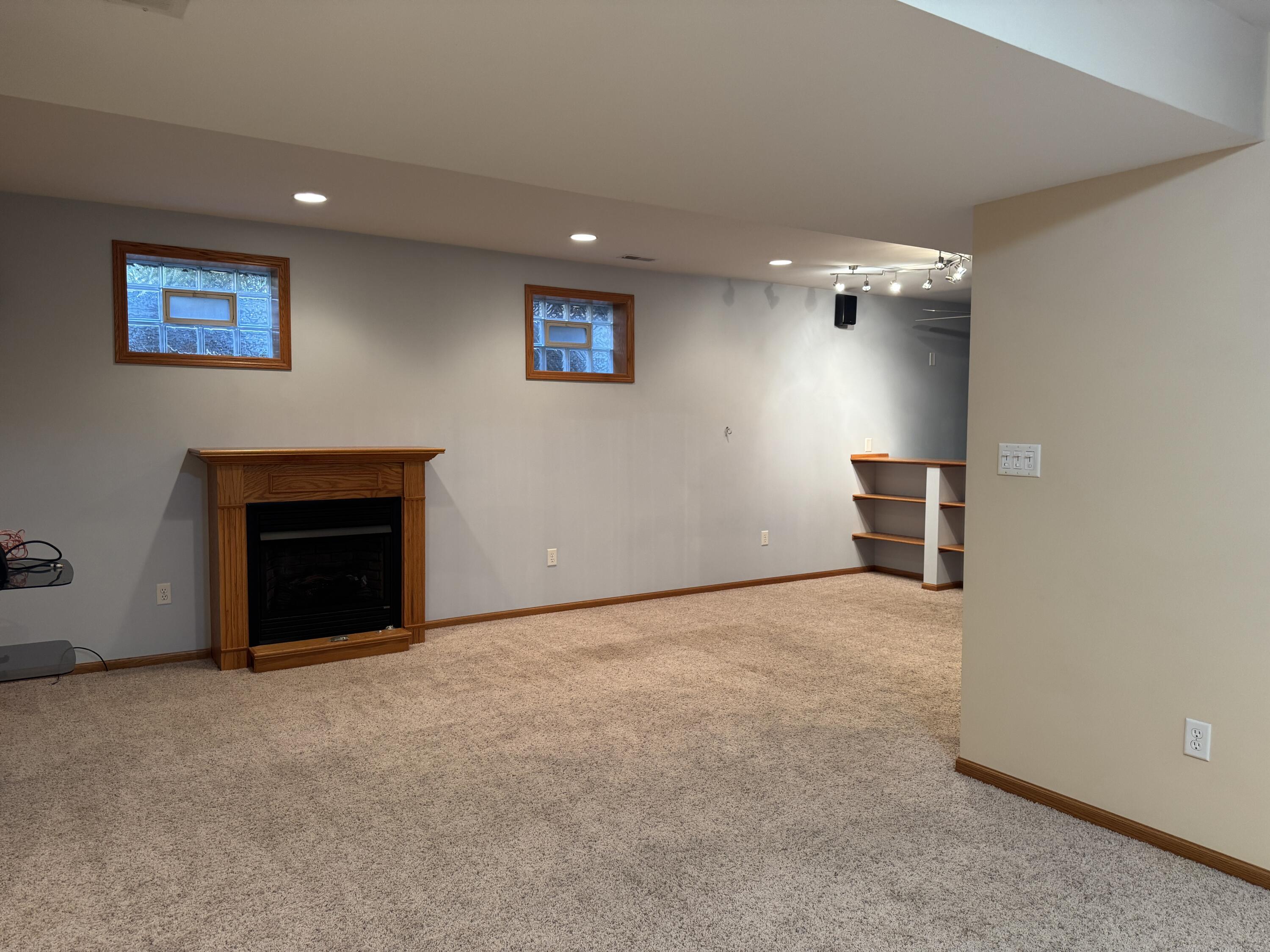 1521 Birdie Way Chesterton, IN 46304 - Photo 51 of 58 a view of empty room with a fireplace