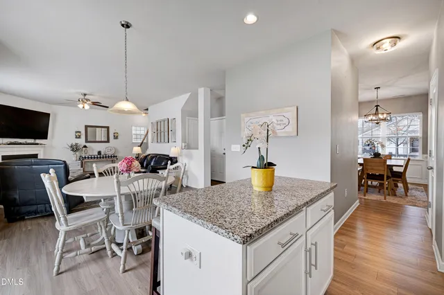 a view of kitchen and dining area with furniture