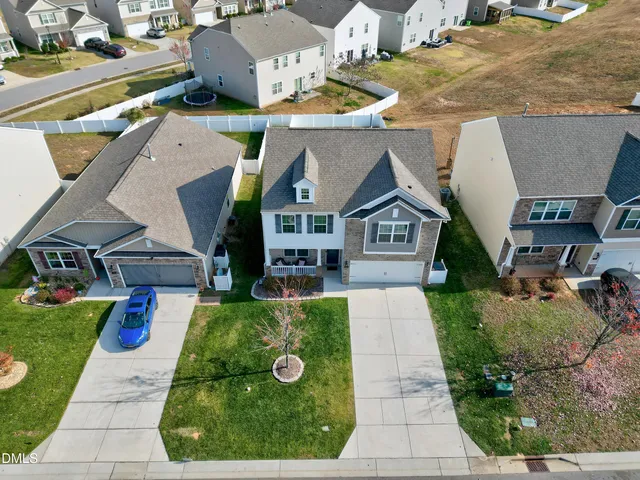 a aerial view of a house with entertaining space