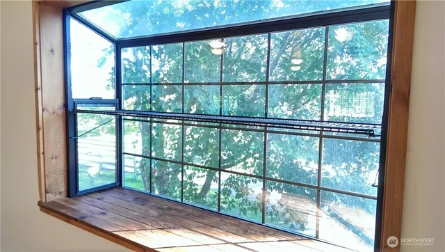 a view of porch with a floor to ceiling window