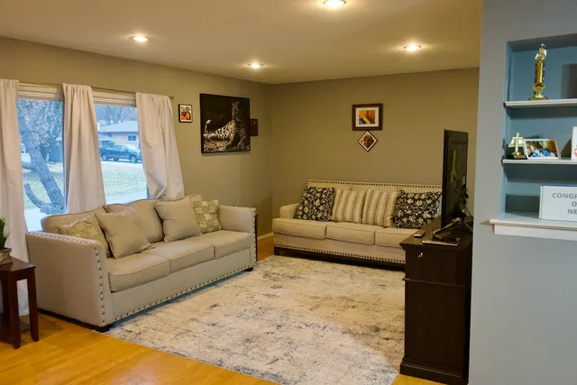 a living room with furniture and a couch