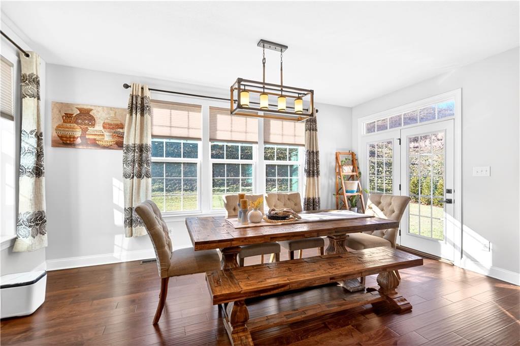 1444 Main Street Pittsburgh, PA 15241 - Photo 15 of 50 a dining room with furniture window and wooden floor