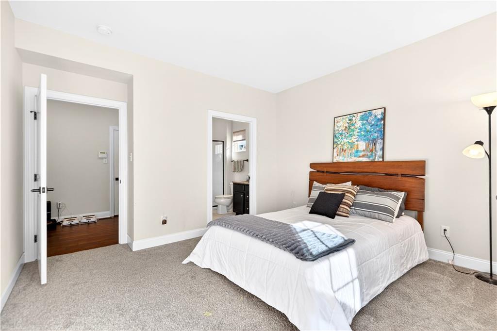 1444 Main Street Pittsburgh, PA 15241 - Photo 22 of 50 a bedroom with a bed and a painting