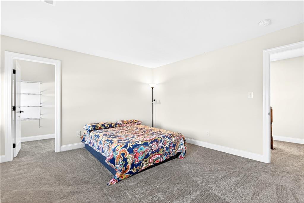 1444 Main Street Pittsburgh, PA 15241 - Photo 24 of 50 a bedroom with a bed and a cabinets