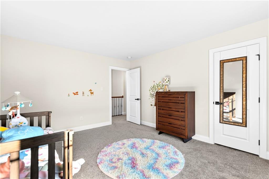 1444 Main Street Pittsburgh, PA 15241 - Photo 26 of 50 a bedroom with a bed and a dresser